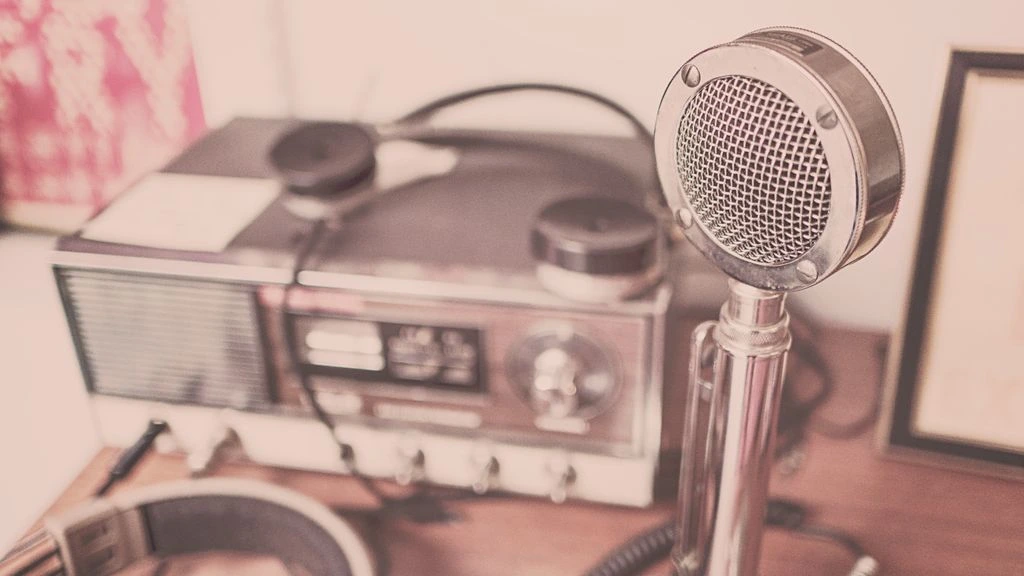 Analog broadcast microphone on a newsroom desk
